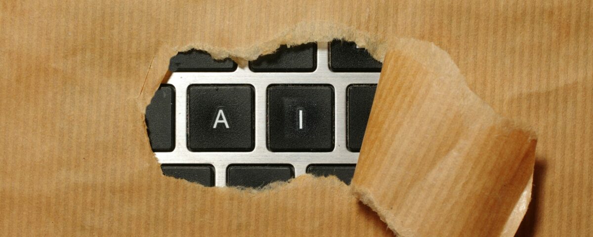 A piece of cardboard with a keyboard appearing through it
