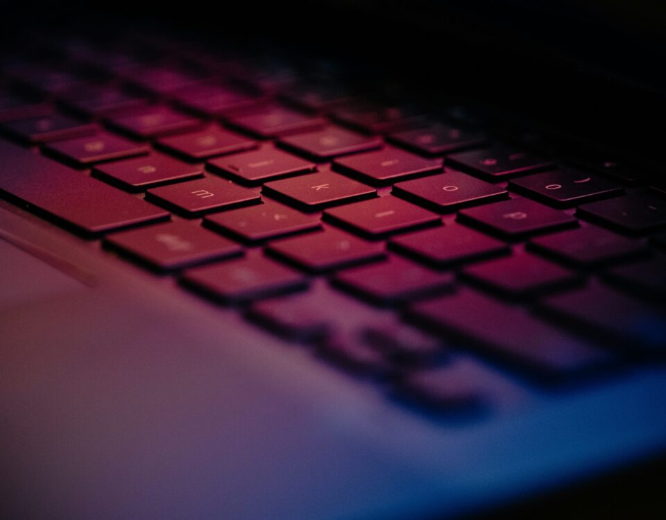 a-close-up-of-a-keyboard-with-a-blurry-background