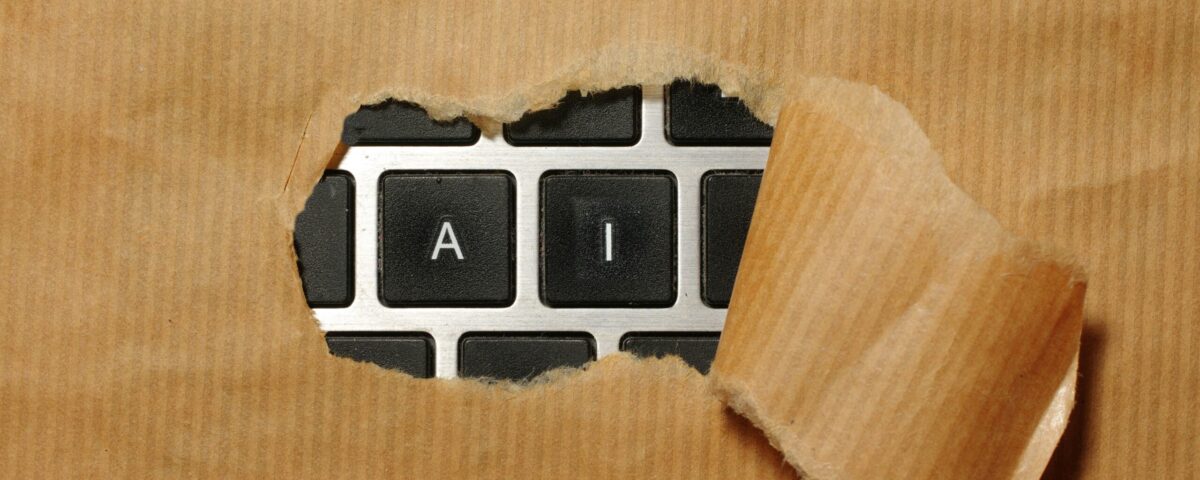 A piece of cardboard with a keyboard appearing through it